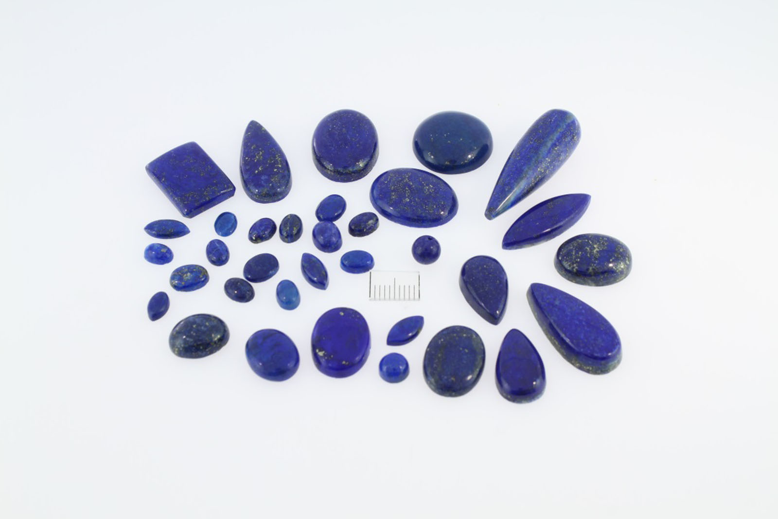Calibrated lapis lazuli cabochons
